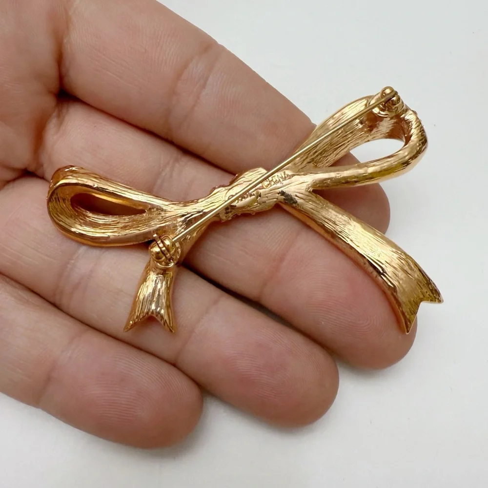 Kenneth Jay Lane KJL Pink Rhinestone Ribbon Bow Goldtone Brooch Pin